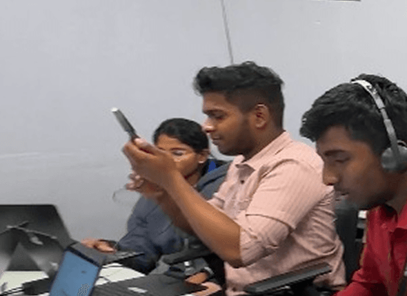 Chennai student practicing on phone